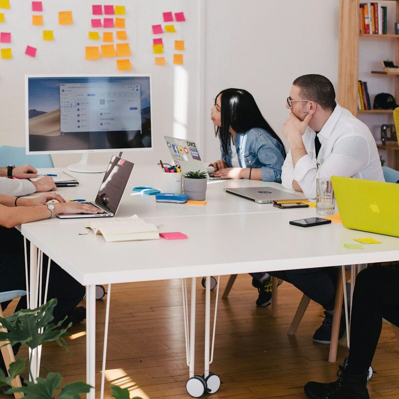 Clever Oak team members in a morning campaign meeting