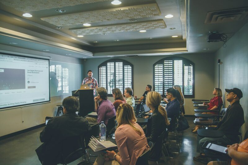 Team members in a hands-on sales training session